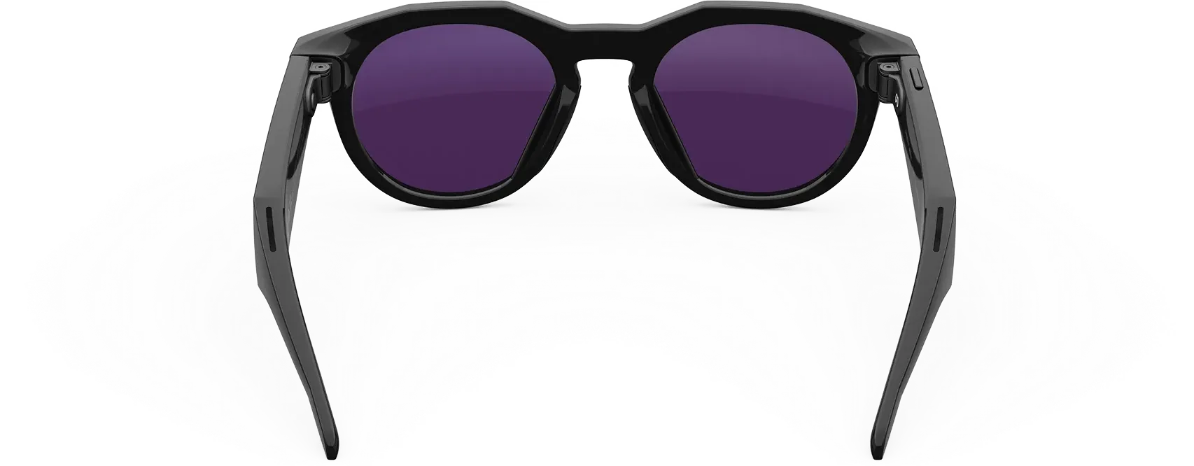 Las Oakley Meta HSTN negras con lentes Transitions amatista, por detrás, con las varillas abiertas.