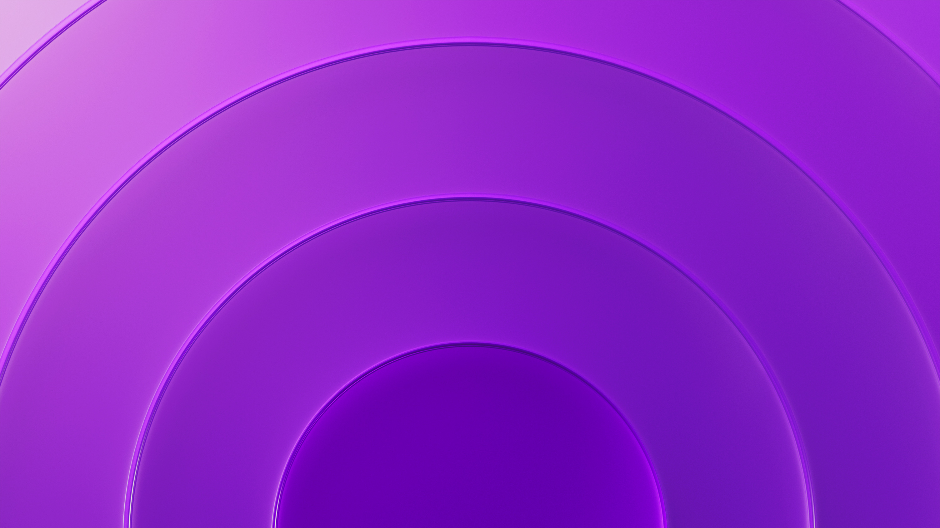 Cuatro anillos ovalados con un degradado morado oscuro que se intensifica a medida que se aleja del anillo central.
