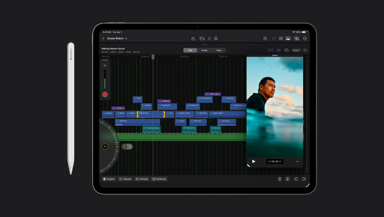 iPad Pro de 13 pulgadas que muestra clips de video organizados en diferentes colores, imagen de un surfista en el mar a la derecha, Apple Pencil a la izquierda del dispositivo