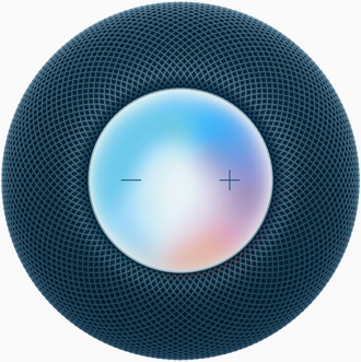 Vista desde arriba de un HomePod mini azul con controles para subir y bajar el volumen en una pantalla colorida.