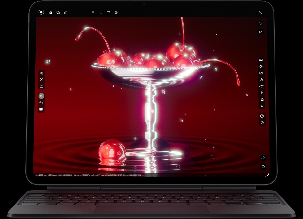 Un iPad Pro, posición horizontal, parte frontal, color negro espacial, esquinas redondeadas, marco de la pantalla negro, conectado a un Magic Keyboard en posición horizontal, parte frontal, color negro, la pantalla muestra una app de edición de fotos con una imagen impactante de unas cerezas dentro de un tazón con forma de copa de martini y gotas de agua